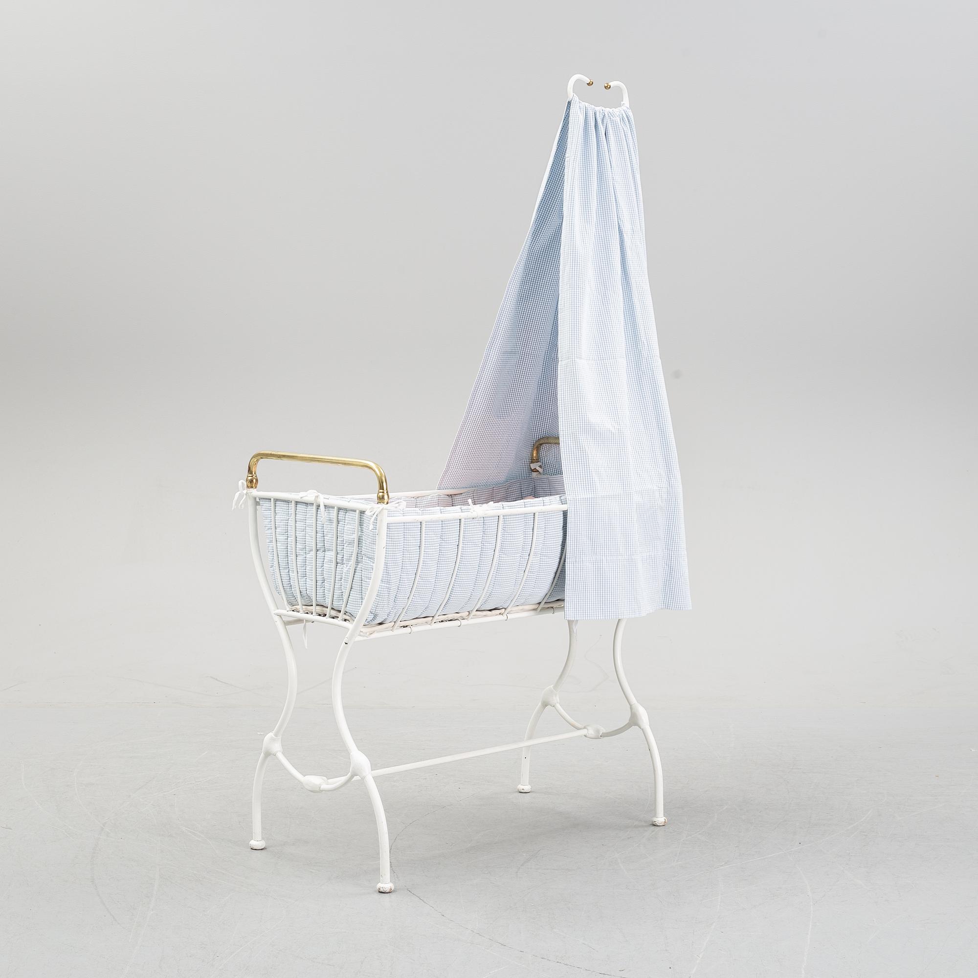 A children's or toddler's crib, the first half of the 20th century.