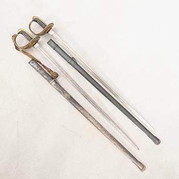 Two Swedish sabres, 1893 cavalry pattern, with scabbards.