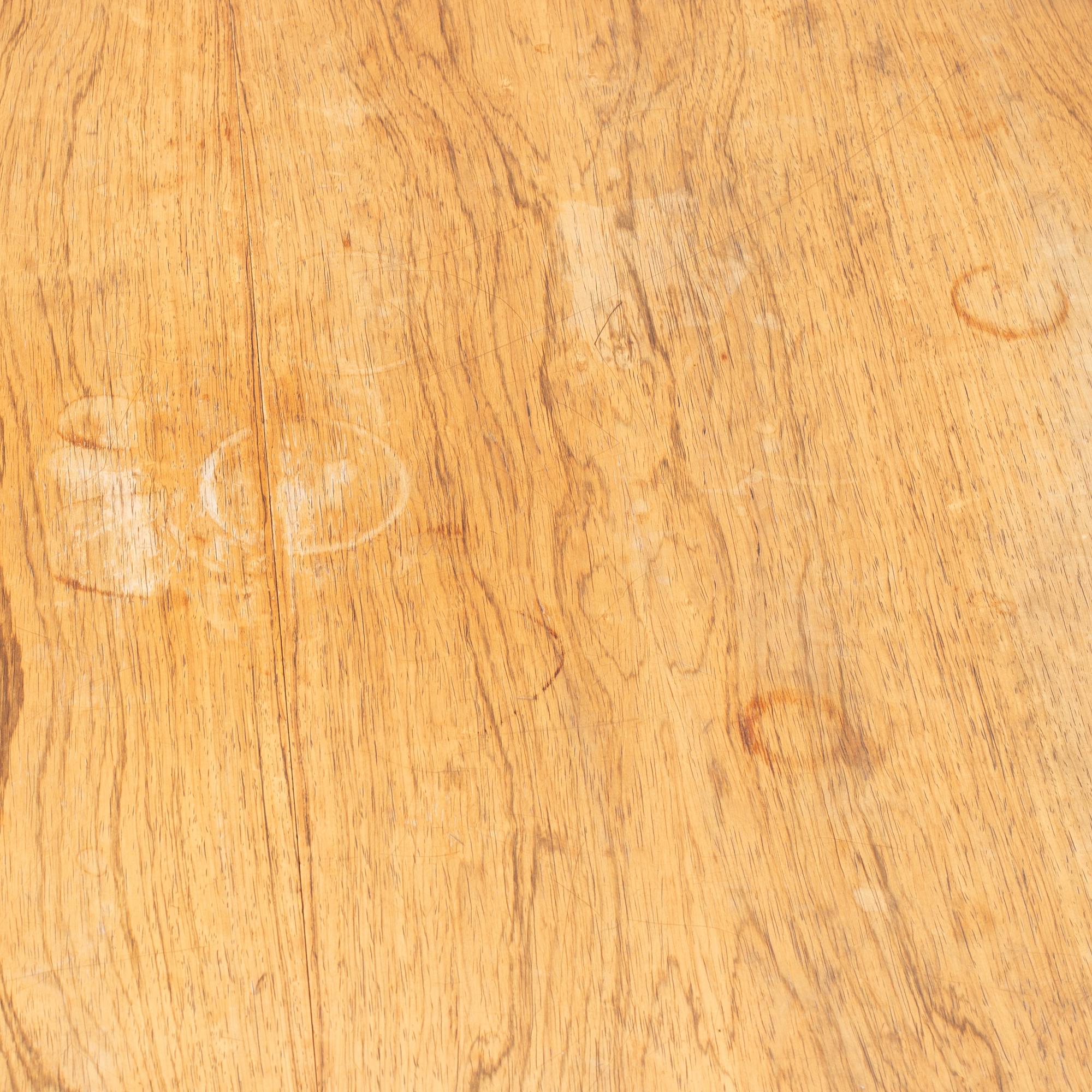 Niels Otto Møller, a rosewood dining table and eight rosewood chairs, Poul Jeppesen & JL Möller, Denmark, 1960's.