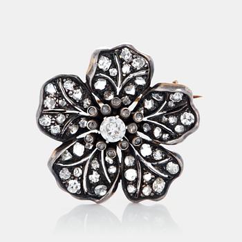 977. A flower brooch set with old-, eight- and rose-cut diamonds.