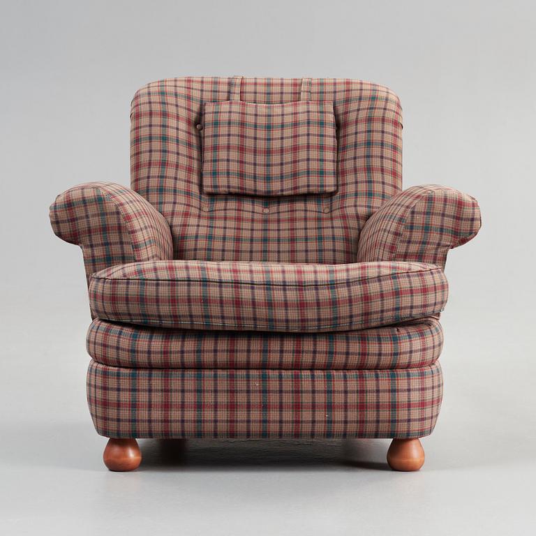 Josef Frank, a 'model 336' armchair, by Svenskt Tenn, Sweden.