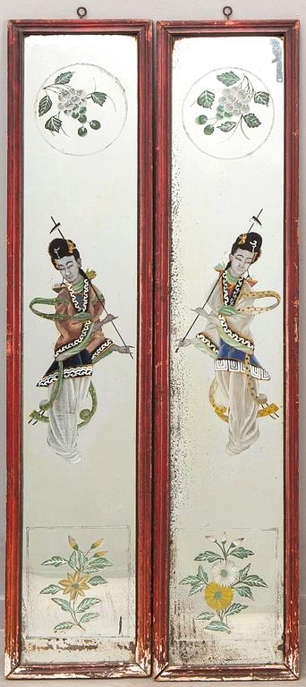 A pair of Chinese around 1900 painted mirrors.