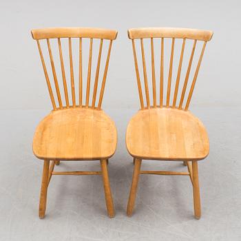 A pair of 'Lilla Åland' chairs by Carl Malmsten, second half of the 20th century.