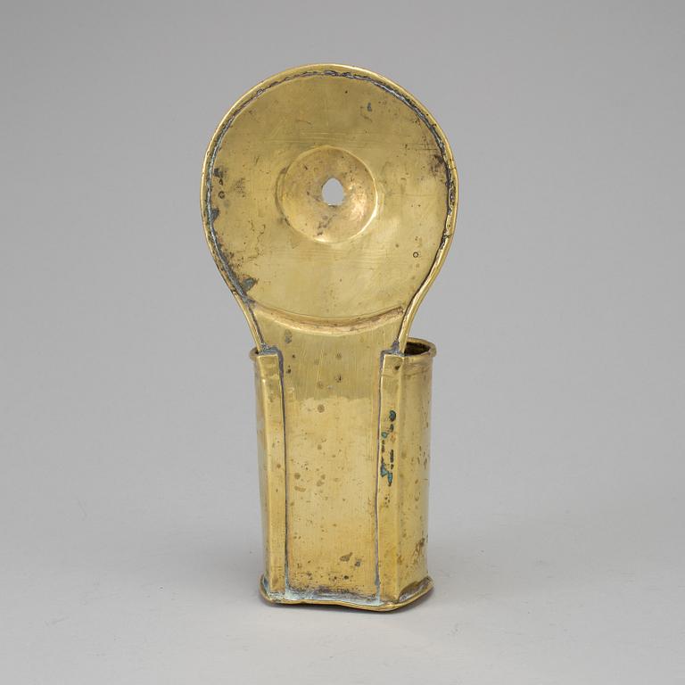 A 18th century brass spoon holder.