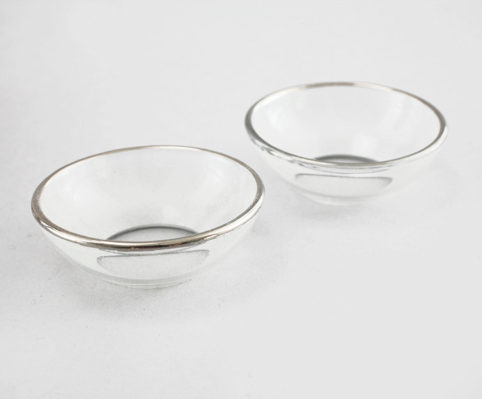 A pair of silver candelsticks by Daniel Eklund, Kalmar, empire, 1854, weight 163.