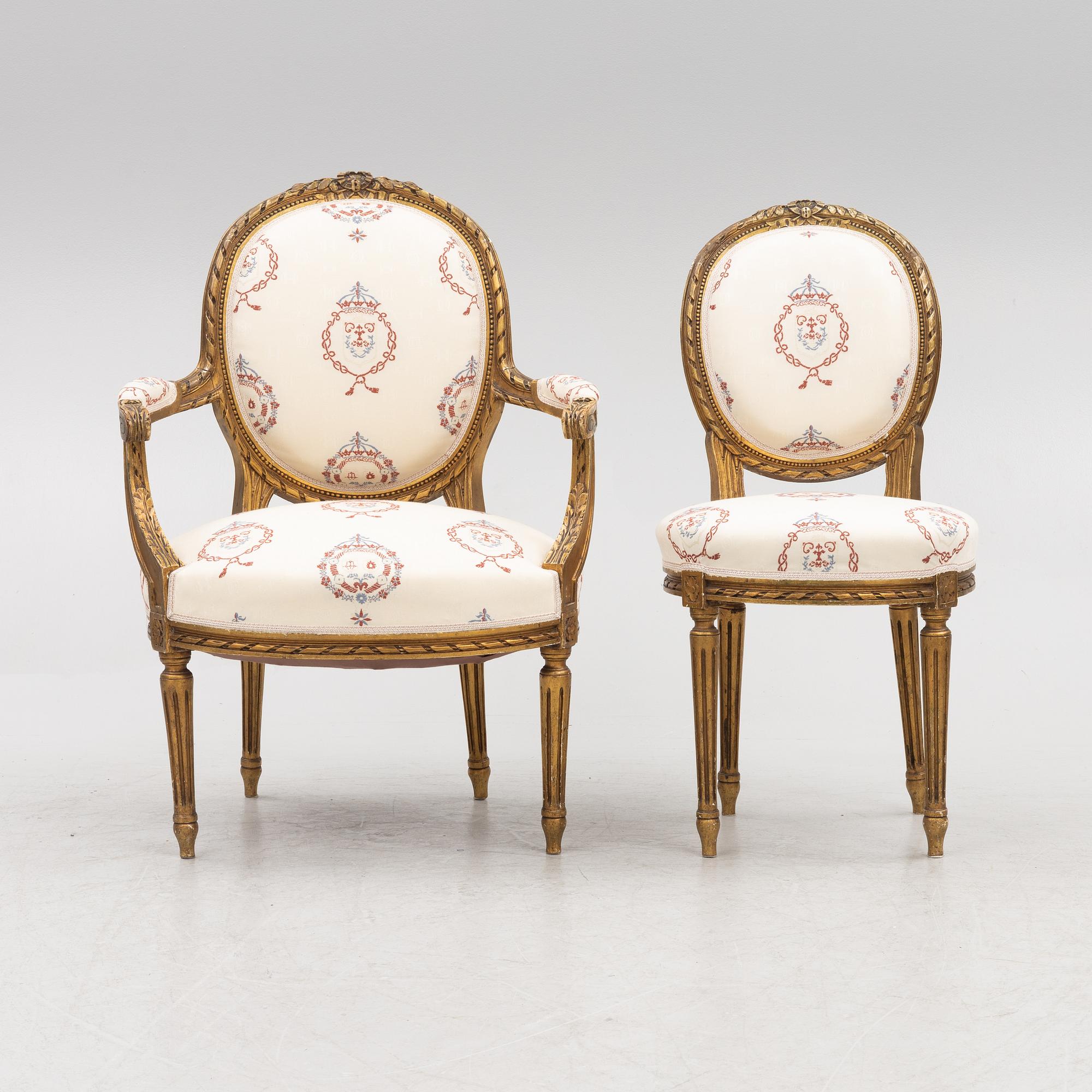 A Gustavian style sofa with two armchairs and two chairs, 20th century.