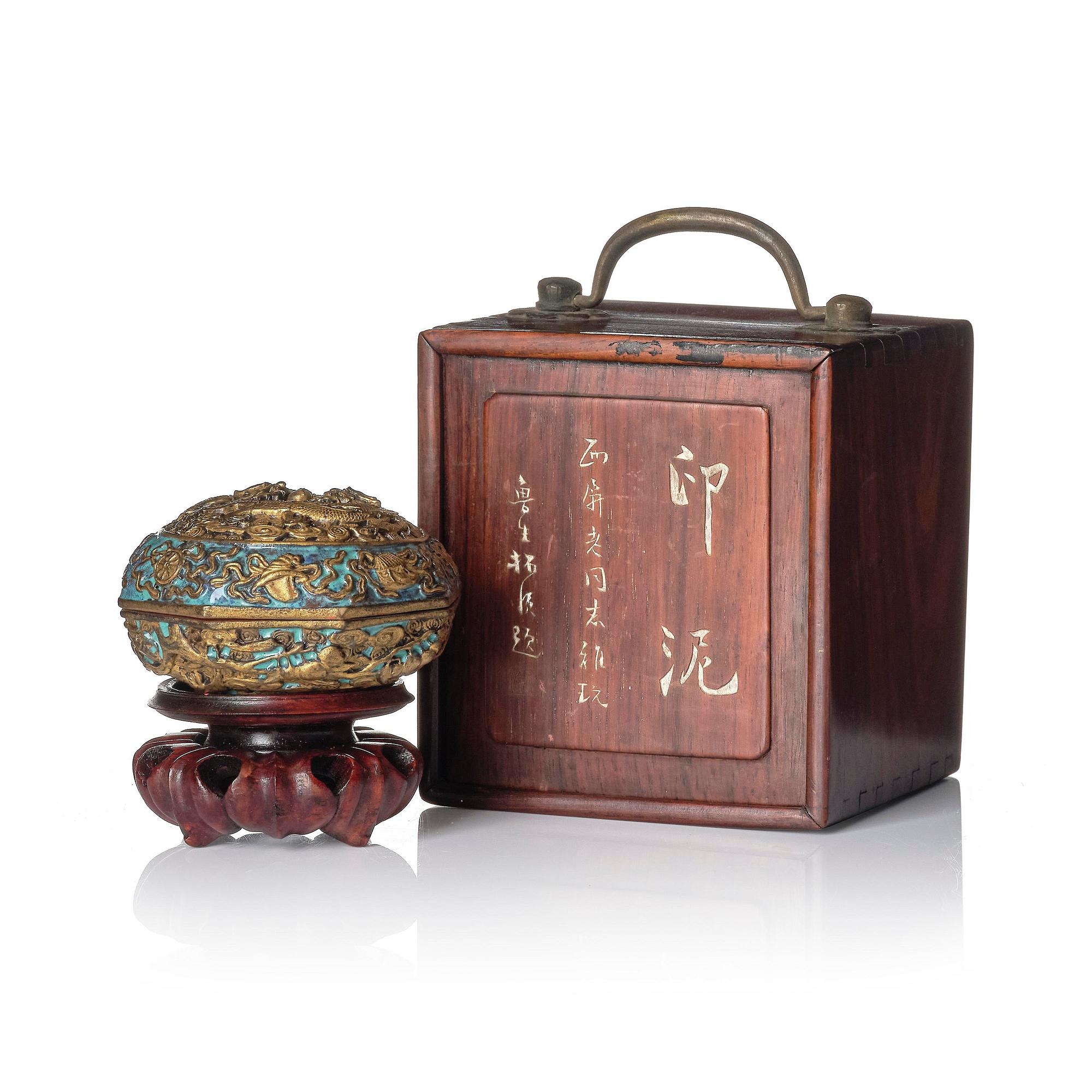 A bronze imitating seal paste box with cover, Qing dynasty, with Qianlong mark.