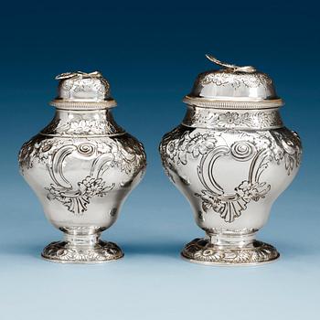 837. An English 18th century silver tea caddie and sugar vase, marks of George Ibbot, London 1754.