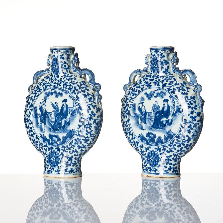 A pair of blue and white moon flasks, Qing dynasty, 19th century.