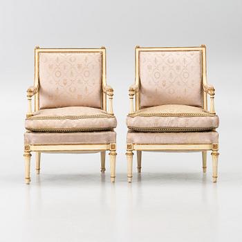 Karmstolar, ett par, Directoire-stil, omkring år 1900.