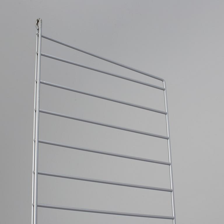 A "String" shelving system by Nils Strinning, about year 2000.