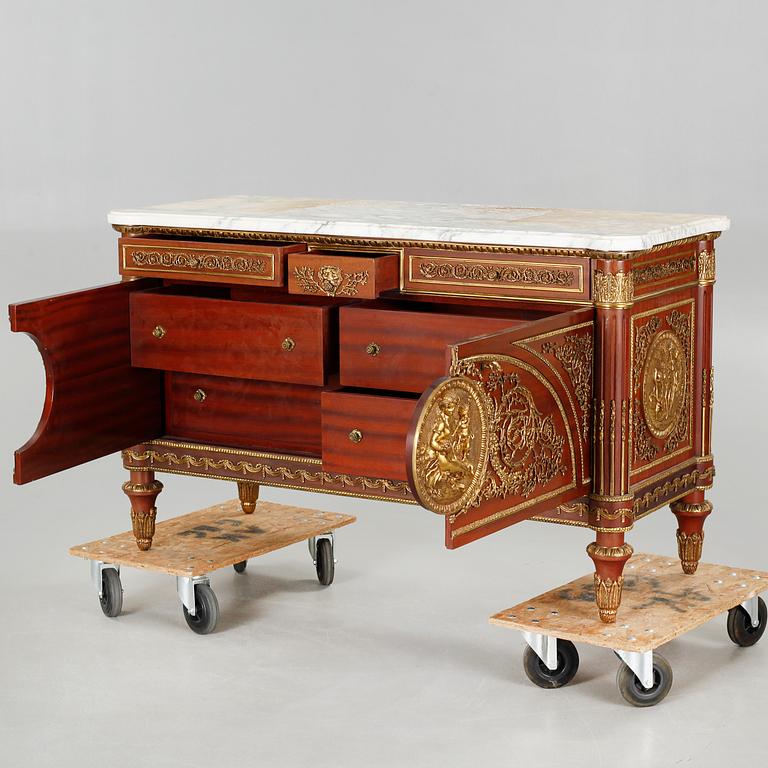 A Louis XVI style chest of drawers, second half of the 20th century.