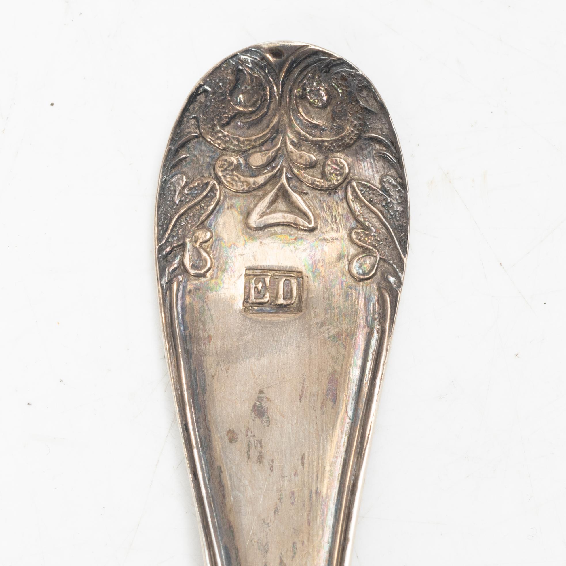 Two pierced silver bowls and two sugar spoons, including Sweden and Endland, 20th century.