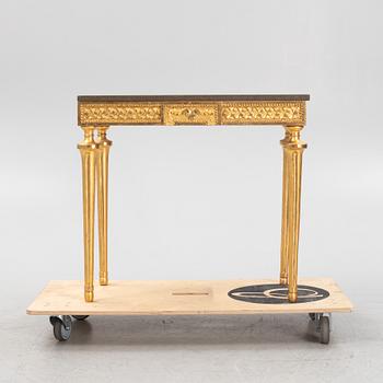 A console table with stone top.