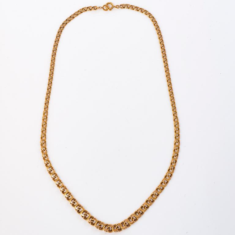 A 14K gold bismarck necklace.