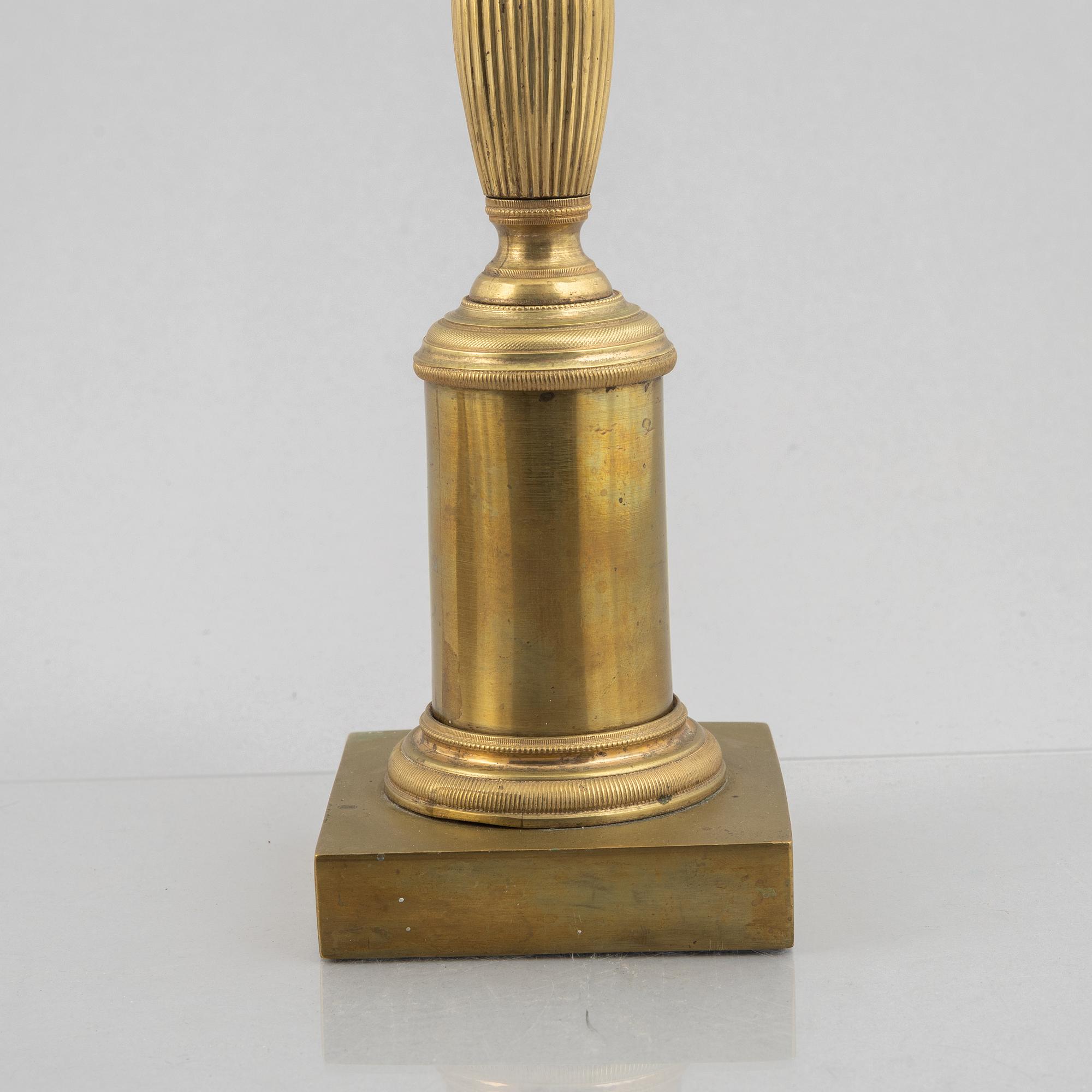 A pair of brass candelabra, first half/mid 19th century.