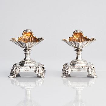 A Swedish pair of salt cellars, parcel-gilt silver, marks of Gustaf Möllenborg, Stockholm 1838.