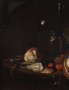 Willem Kalf In the manner of the artist, Still life with oysters, wine glass, clay pipe, fruits and insects.