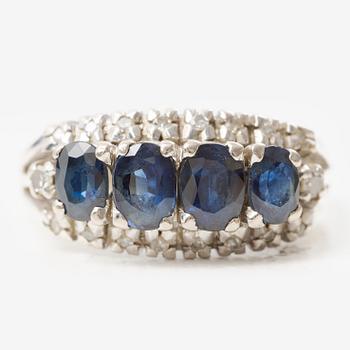 Ring, 18K white gold with dark sapphires and octagon-cut diamonds.