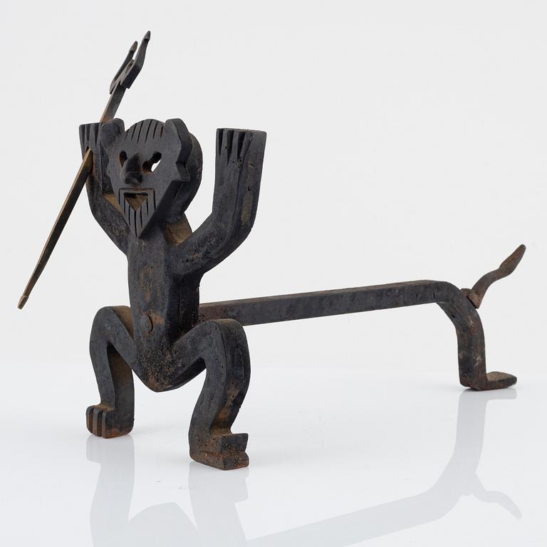 A cast iron fire dog by Eskil Björklund, second half of the 20th century.