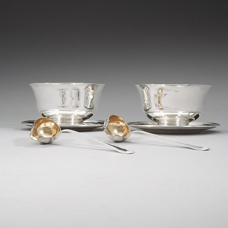 A pair of Swedish 19th century parcel-gilt sauce-bowls and spoons, Johan Petter Grönvall, Stockholm 1823.