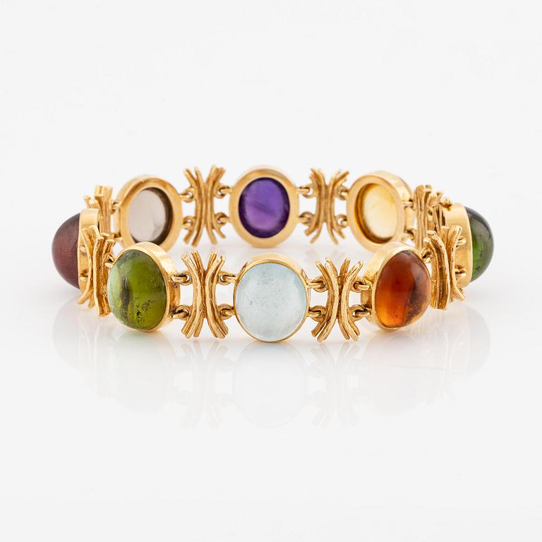 W.A. Bolin, design Barbro Littmarck, armband, 18K guld med cabochonslipade färgstenar, Stockholm 1970.