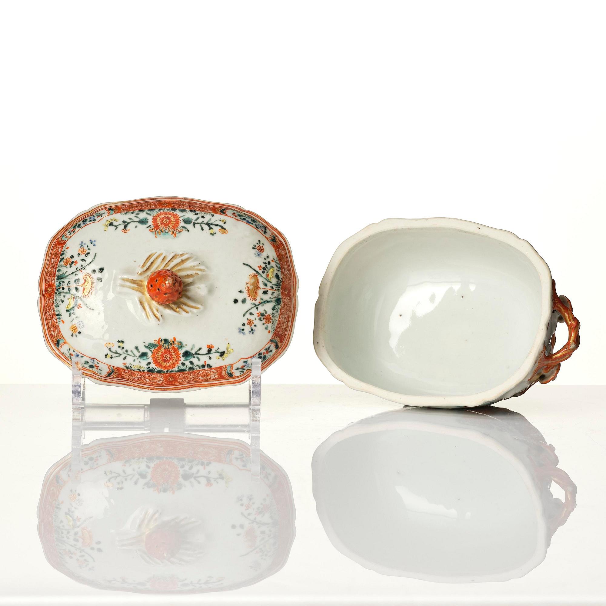 A famille rose butter tureen with cover and stand, Qing dynasty, 18th century.