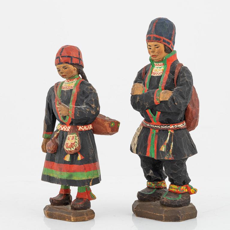 Torborg Lindberg-Karlsson, a pair of figurines, carved and painted wood, signed TL.