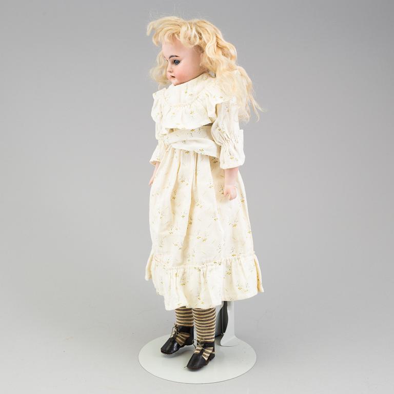 a Armand Marseille porcelain doll from around 1900.