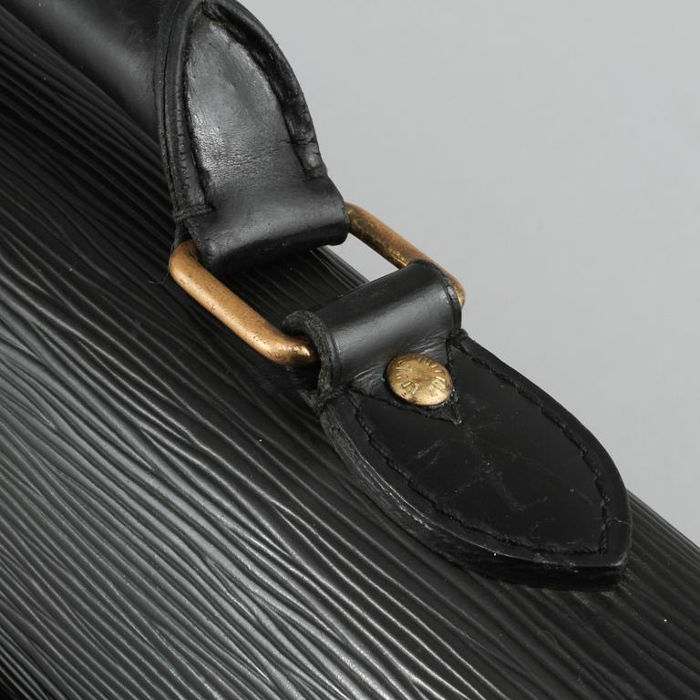 PORTFÖLJ, "Serviette conseiller ambassadeure Epi", Louis Vuitton.