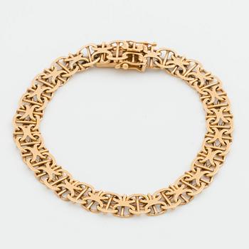 ARMBAND 18K guld x-länk med stav, Stockholm 1968.