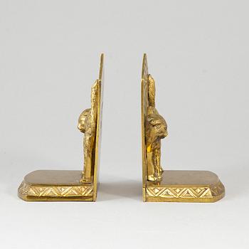 A pair of art déco bronze book ends, 1930s.