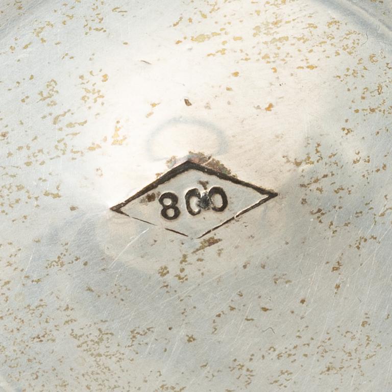 Two pierced silver bowls and two sugar spoons, including Sweden and Endland, 20th century.