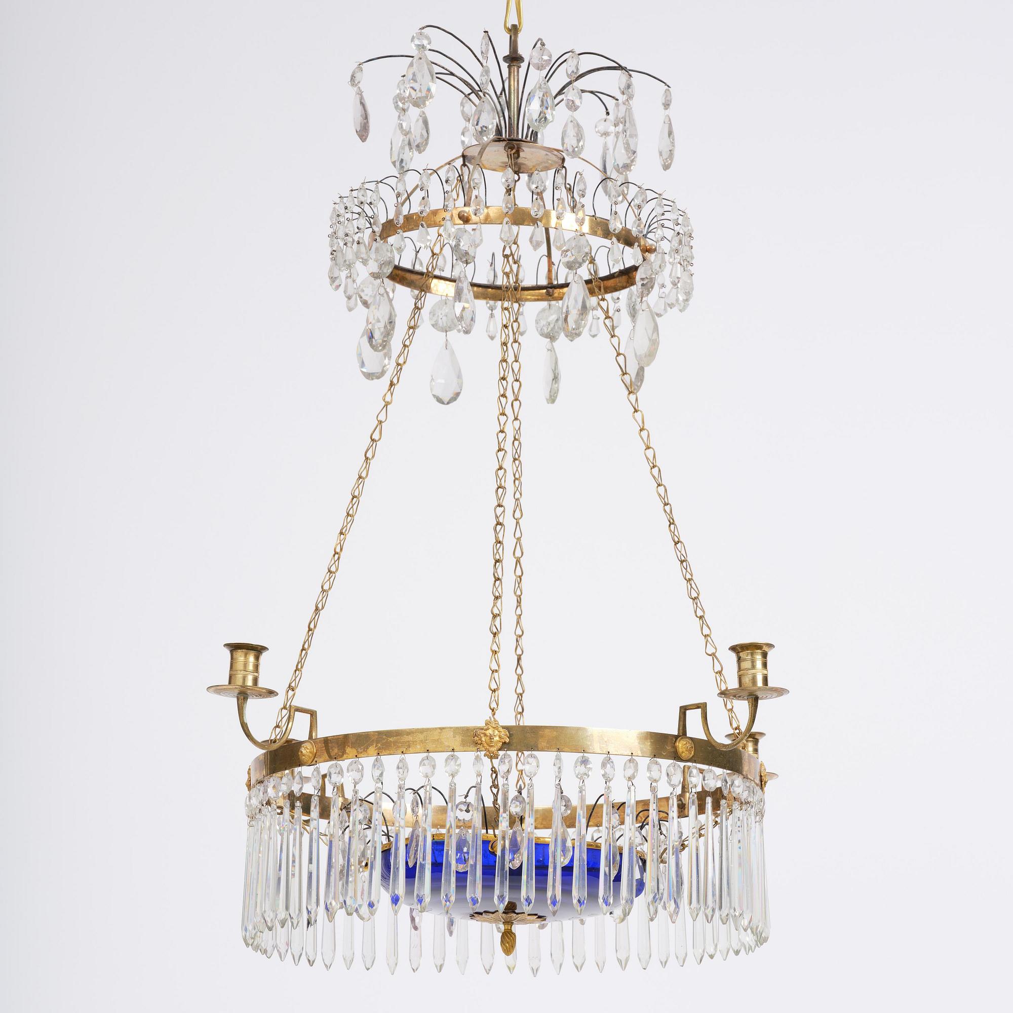 A late Gustavian five-light gilt brass and cut glass chandelier, Stockholm, late 18th century.