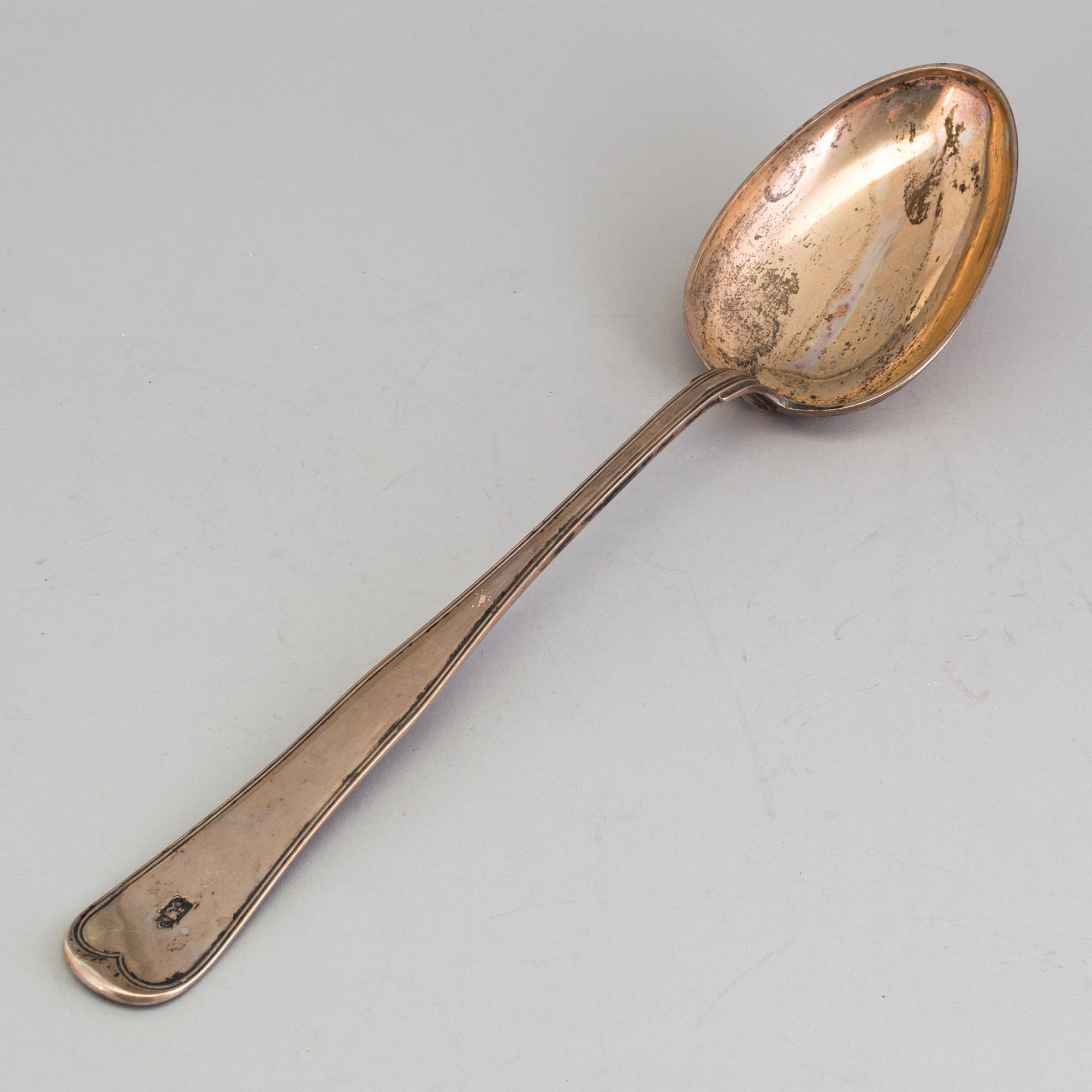 A silver serving spoon, maker's mark V. Christensen, Copenhagen, 1876 and LADLE, silver, Carl Fahlberg, Uppsala, 1792.