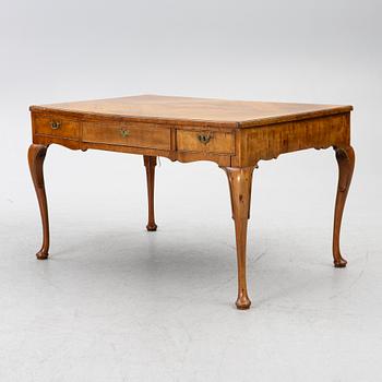 A George II walnut partner's desk, mid 18th century.