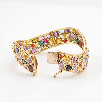 Armring, 18K gold with coloured gemstones, Italy.