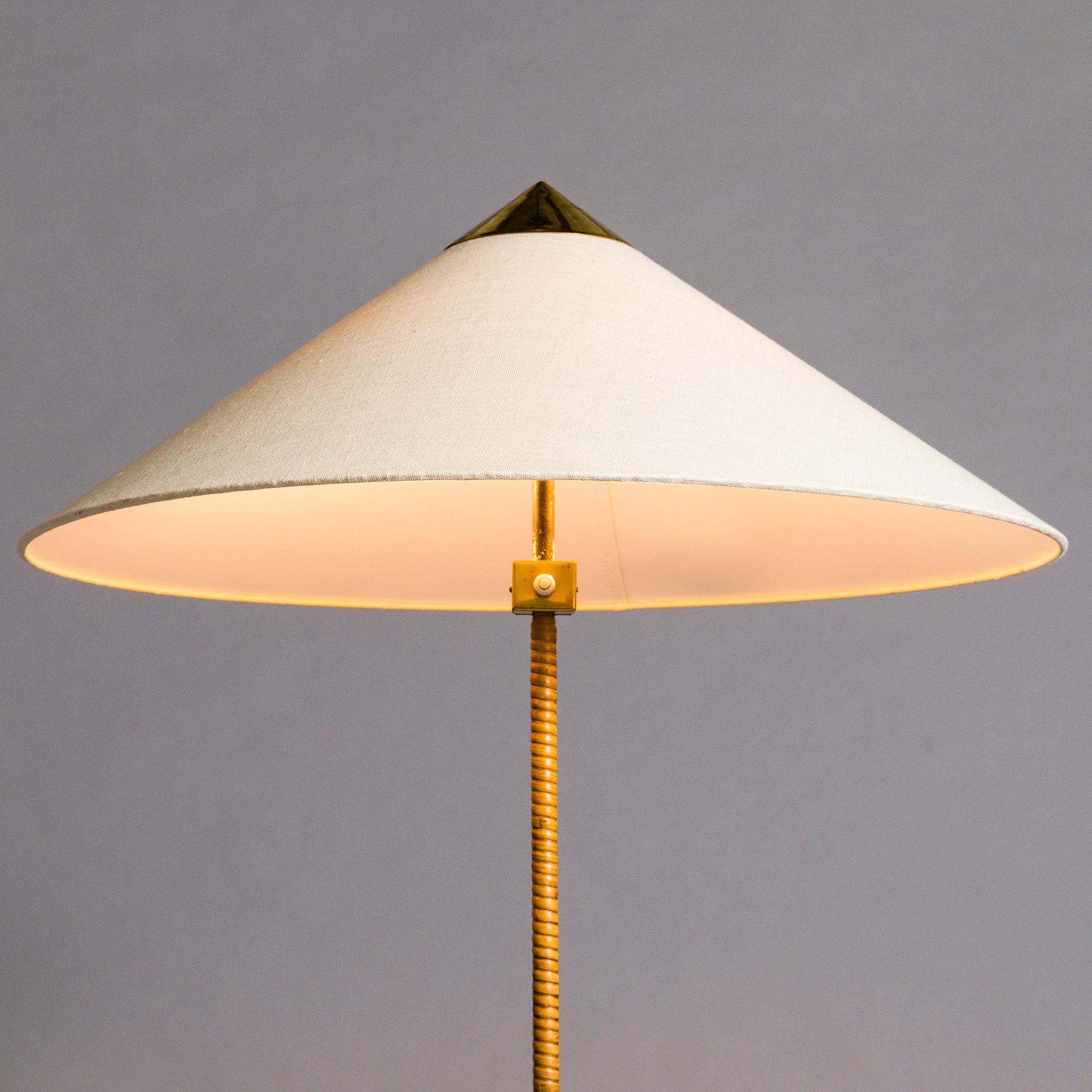 PAAVO TYNELL, A mid-20th century floor lamp for Taito, Finland.