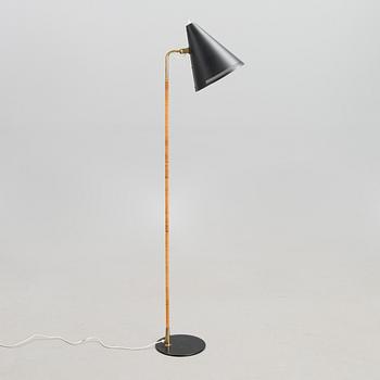 A mid-20th century standard lamp model K10-10 for Idman.