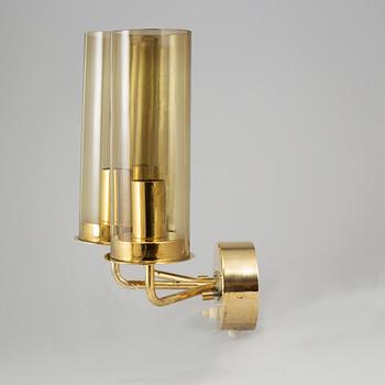 A pair of brass and glass wall sconces by Hans-Agne Jakobsson, Markaryd, second half of the 20th century.