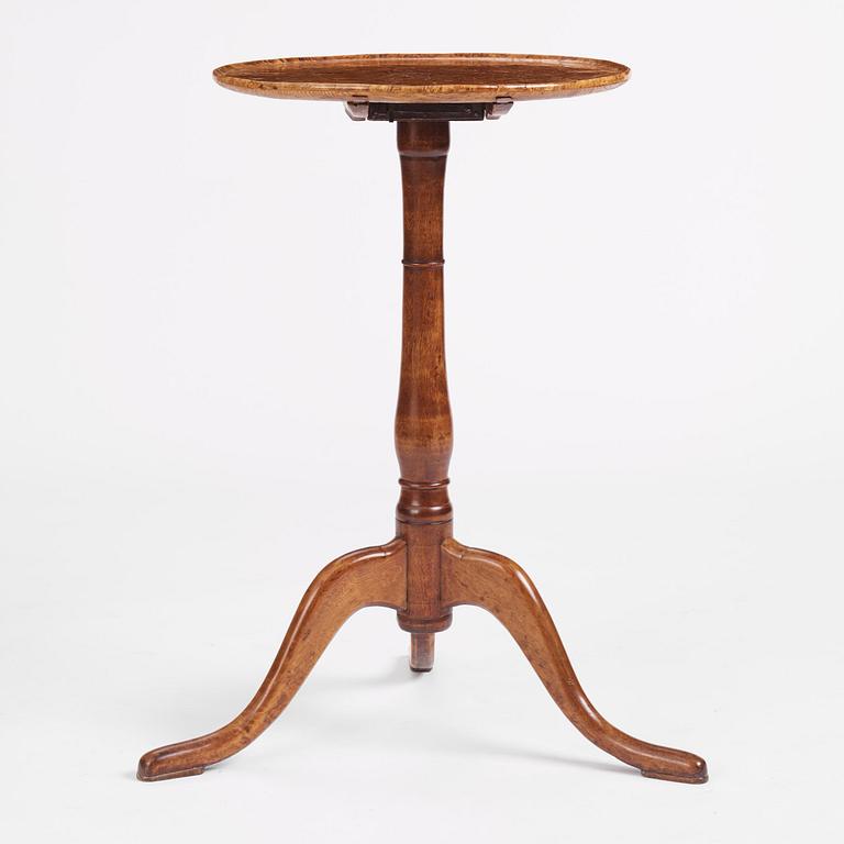 A burr-alder tilt-top table by J. Sjölin (master 1767-1785).