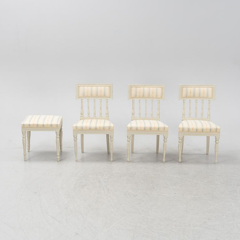 A set of three chairs and a stoolm late Gustavian style from around the year 1900.