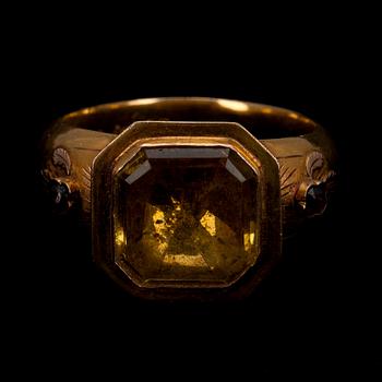 RING, 18K guld, glas, granat. G. A. Weckman Tavastehus 1863. Vikt 4,7 g.