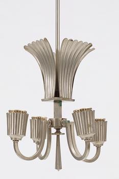 A 1920-30's white metal four-light ceiling lamp.