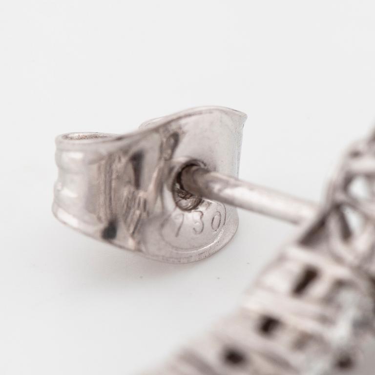 A pair of pear cut emerald and brilliant cut diamond earrings.