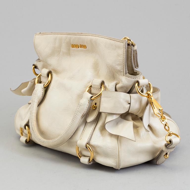 A bag by Miu Miu.