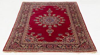 An oriental rug, c. 205 x 133 cm.
