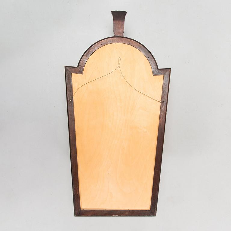 A 1930s Art Deco mirror.