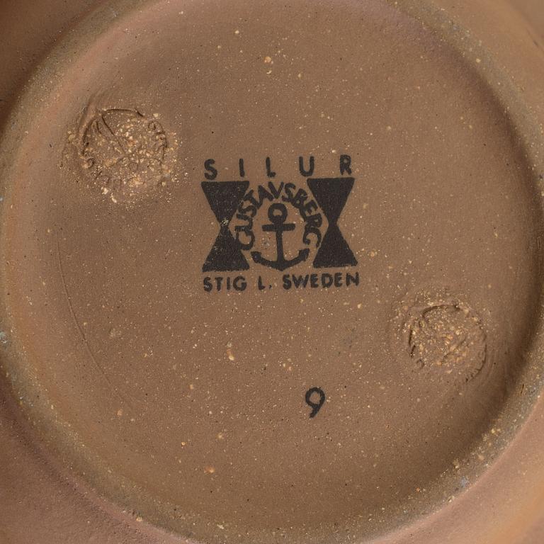 Four mid 20th century dishes by Stig Lindberg for Gustavsberg, two 'Domino', one 'Silur' and one signed.