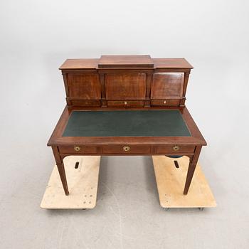 A Gustavian style mahogany desk around 1900.